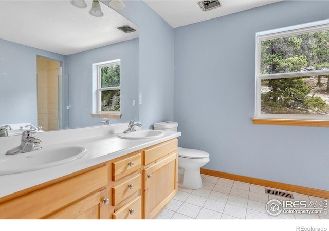 65 La Chula Rd, Black Hawk, CO 80422 - full bathroom with toilet, tile patterned flooring, double vanity, and baseboards