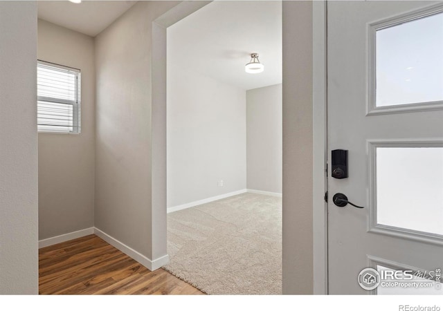 10069 Richfield St, Commerce City, CO 80022 - entryway with baseboards and wood finished floors