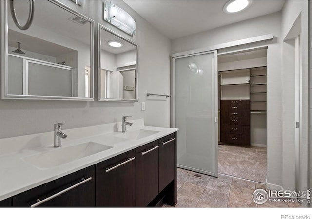 10069 Richfield St, Commerce City, CO 80022 - full bath featuring double vanity and a shower