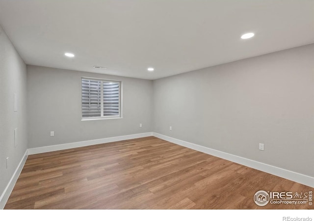 10069 Richfield St, Commerce City, CO 80022 - empty room with baseboards, light wood-style floors, and recessed lighting