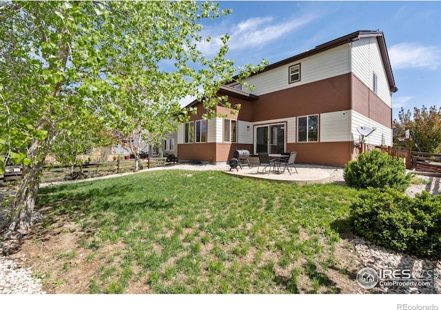 10069 Richfield St, Commerce City, CO 80022 - back of property featuring a patio