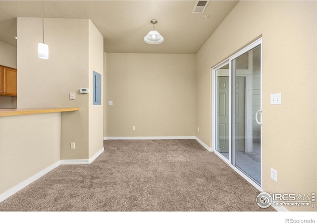 spare room with carpet flooring and baseboards