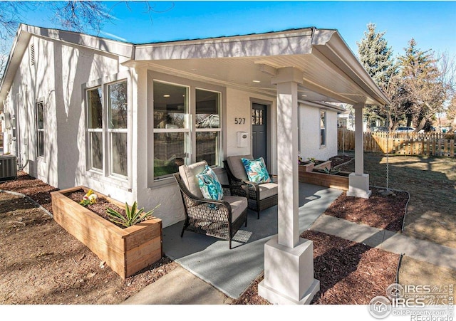 527 S Bryan Ave, Fort Collins, CO 80521 - view of patio with fence and central AC unit