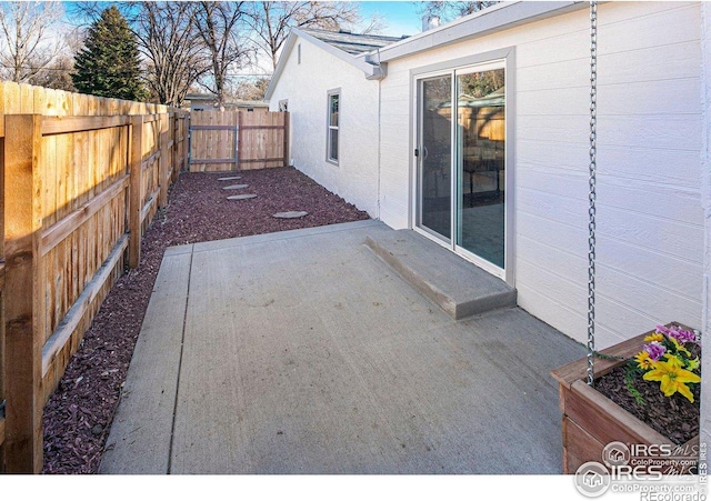 527 S Bryan Ave, Fort Collins, CO 80521 - view of patio featuring a fenced backyard