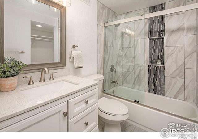 527 S Bryan Ave, Fort Collins, CO 80521 - full bath with toilet, combined bath / shower with glass door, and vanity