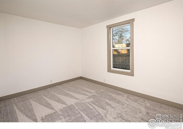 527 S Bryan Ave, Fort Collins, CO 80521 - unfurnished room with carpet floors and baseboards