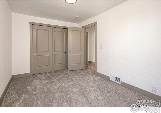 527 S Bryan Ave, Fort Collins, CO 80521 - unfurnished bedroom featuring carpet, baseboards, and a closet
