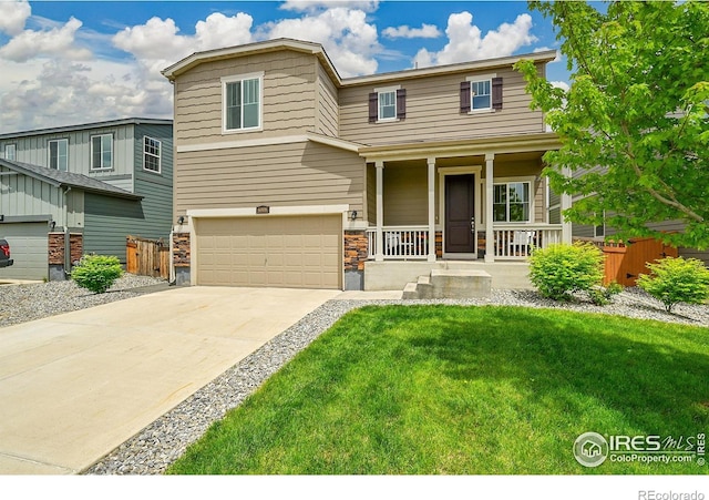 6008 Sandstone Cir, Frederick, CO 80516 - view of front of house featuring a porch, a garage, and driveway
