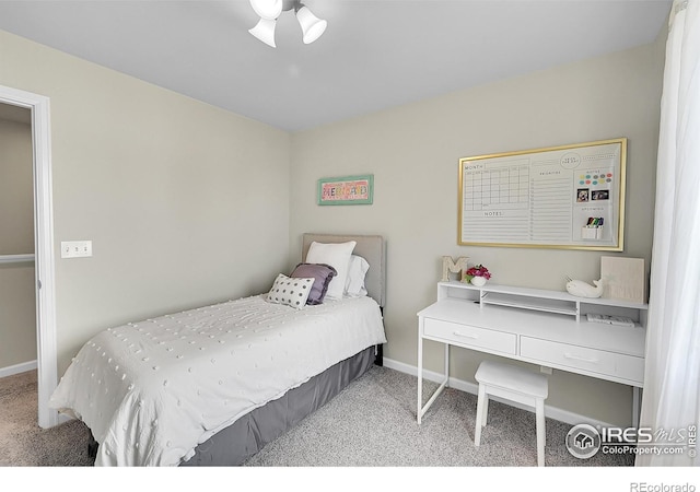 6008 Sandstone Cir, Frederick, CO 80516 - carpeted bedroom featuring baseboards