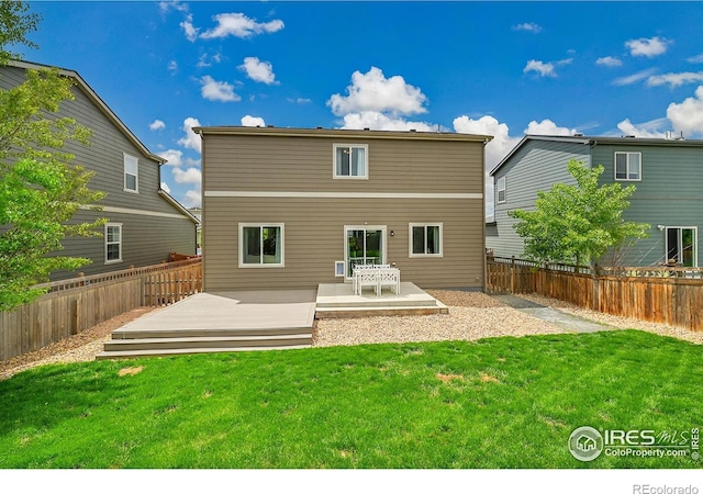 6008 Sandstone Cir, Frederick, CO 80516 - back of house featuring a wooden deck
