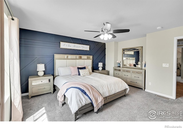 6008 Sandstone Cir, Frederick, CO 80516 - carpeted bedroom with ceiling fan and baseboards