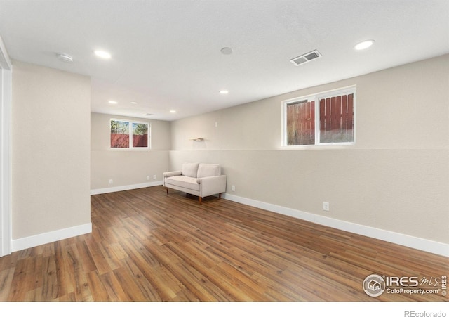 312 21st Avenue Ct, Greeley, CO 80631 - unfurnished room with wood finished floors, baseboards, and recessed lighting