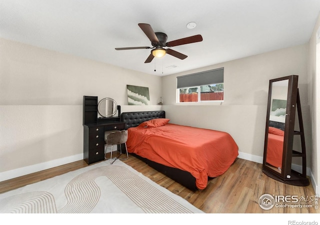 312 21st Avenue Ct, Greeley, CO 80631 - bedroom featuring wood finished floors, baseboards, and ceiling fan