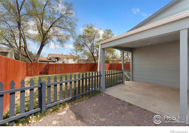 312 21st Avenue Ct, Greeley, CO 80631 - fenced backyard featuring a patio
