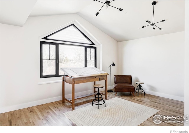 4932 Valkyrie Dr, Boulder, CO 80301 - office area with lofted ceiling, wood finished floors, a chandelier, and baseboards