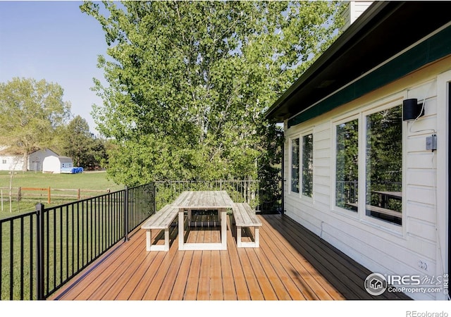 4932 Valkyrie Dr, Boulder, CO 80301 - deck with outdoor dining area and a lawn