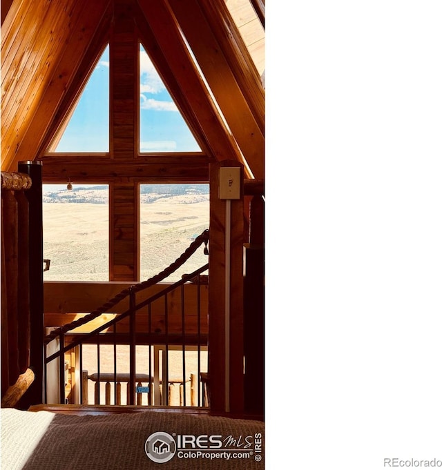867 Windy Ridge Rd, Red Feather Lakes, CO 80545 - staircase with vaulted ceiling