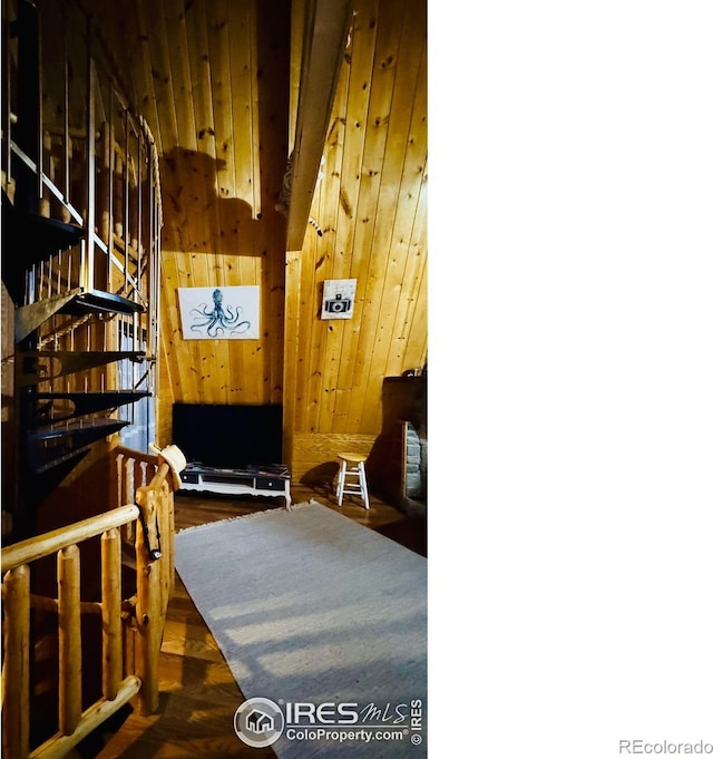 867 Windy Ridge Rd, Red Feather Lakes, CO 80545 - bedroom featuring wood walls