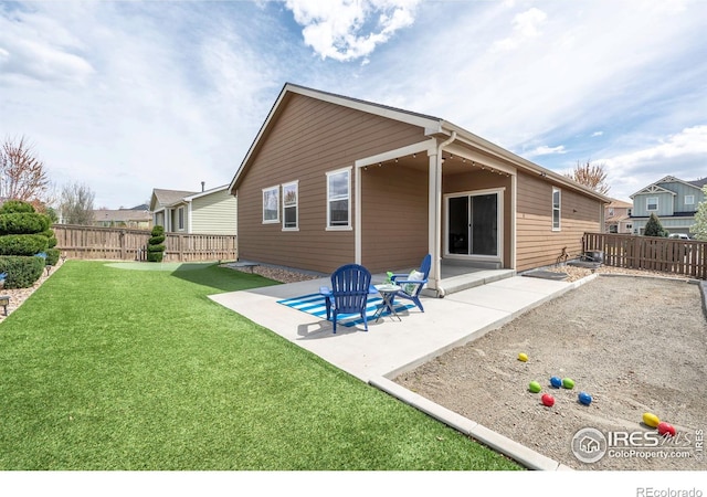 1358 14th Ave, Longmont, CO 80501 - back of house featuring a patio area