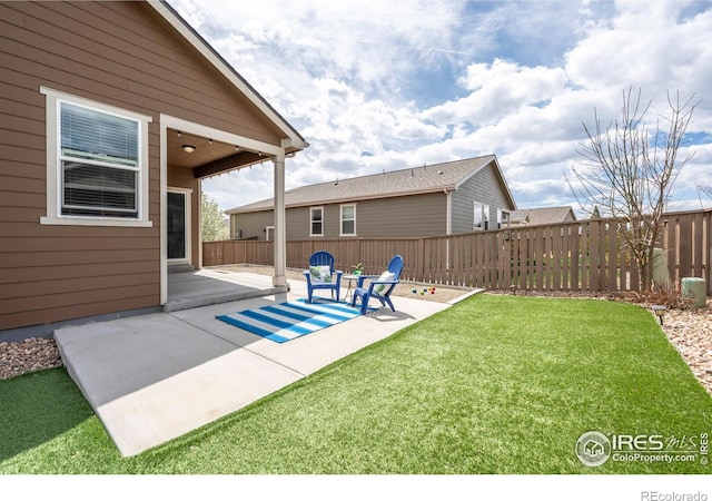 1358 14th Ave, Longmont, CO 80501 - view of yard featuring a patio area