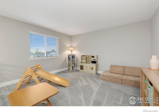 1203 Cabot Ct, Fort Collins, CO 80526 - rec room featuring baseboards and carpet flooring