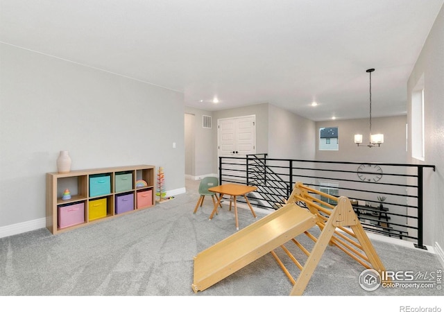 1203 Cabot Ct, Fort Collins, CO 80526 - hall featuring an upstairs landing, baseboards, carpet floors, a chandelier, and recessed lighting