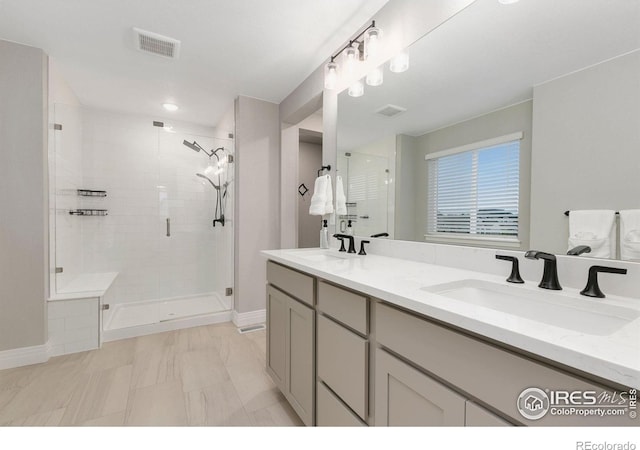 1203 Cabot Ct, Fort Collins, CO 80526 - full bath with a shower stall, baseboards, and double vanity
