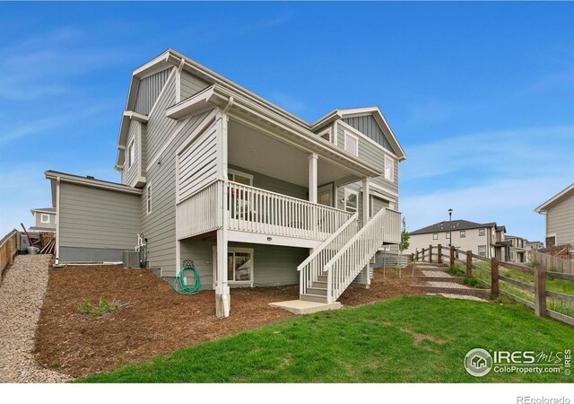 1203 Cabot Ct, Fort Collins, CO 80526 - view of front of house featuring cooling unit, stairs, and board and batten siding