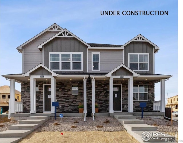 18722 E 99th Ave, Commerce City, CO 80022 - craftsman-style home featuring board and batten siding, covered porch, and stone siding