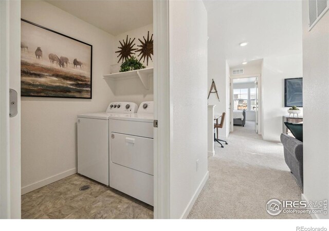 18722 E 99th Ave, Commerce City, CO 80022 - washroom with separate washer and dryer, baseboards, and light colored carpet