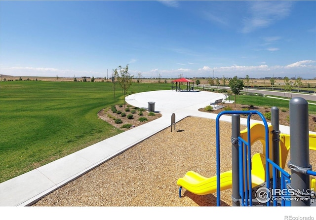 18722 E 99th Ave, Commerce City, CO 80022 - view of community featuring a yard