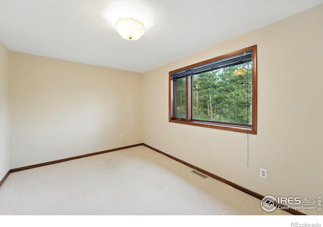 1101 Peakview Cir, Boulder, CO 80302 - carpeted empty room with baseboards
