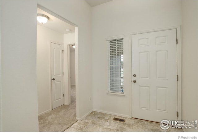 1540 Murrlet St, Berthoud, CO 80513 - foyer with baseboards