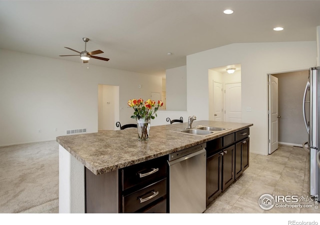 1540 Murrlet St, Berthoud, CO 80513 - kitchen featuring stainless steel appliances, ceiling fan, a sink, an island with sink, and lofted ceiling