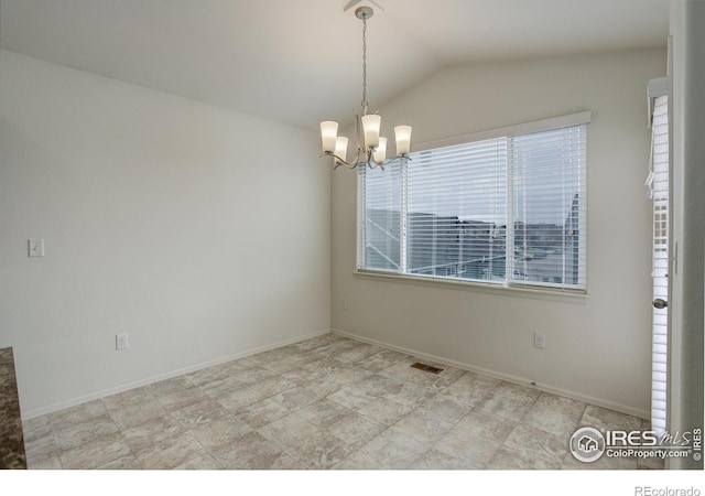 1540 Murrlet St, Berthoud, CO 80513 - empty room with a chandelier, vaulted ceiling, and baseboards