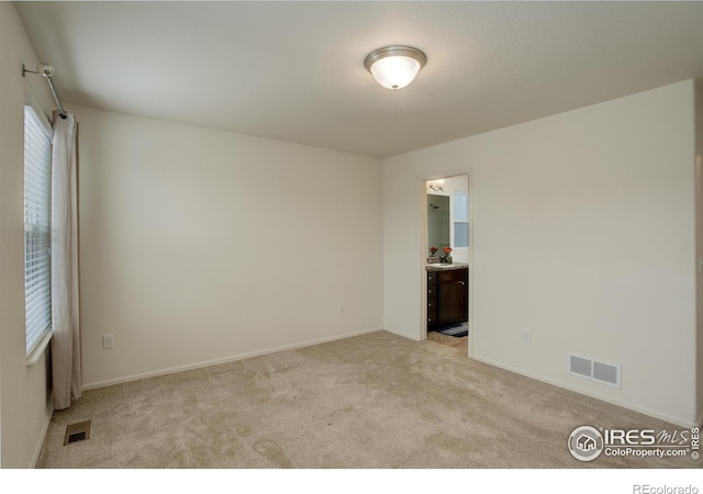 1540 Murrlet St, Berthoud, CO 80513 - spare room featuring light carpet and baseboards
