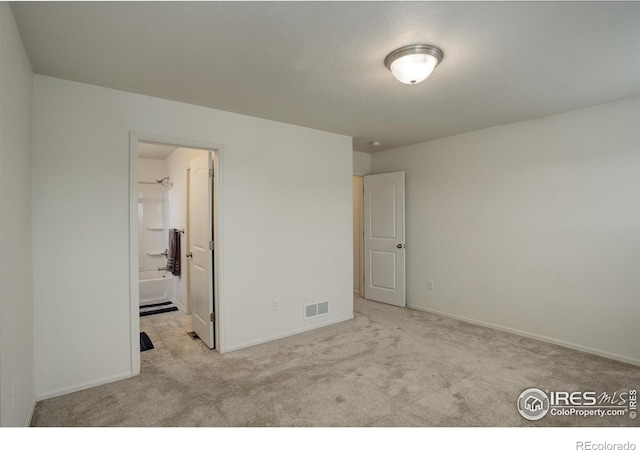 1540 Murrlet St, Berthoud, CO 80513 - unfurnished bedroom featuring carpet flooring, baseboards, and ensuite bath