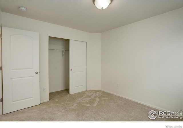 1540 Murrlet St, Berthoud, CO 80513 - unfurnished bedroom with carpet floors, a closet, and baseboards