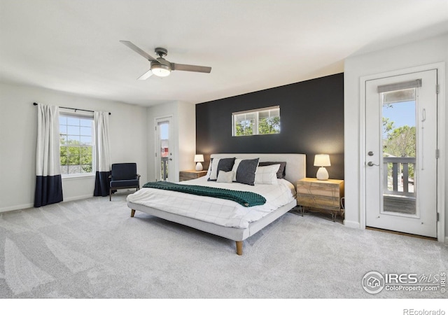 4109 Frederick Cir, Longmont, CO 80503 - carpeted bedroom featuring access to outside, baseboards, and a ceiling fan