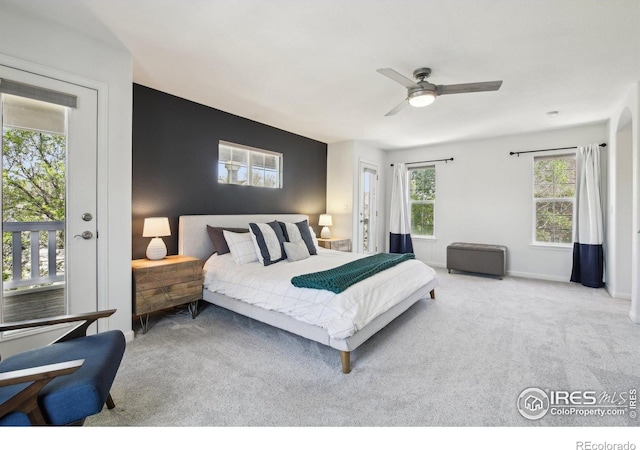 4109 Frederick Cir, Longmont, CO 80503 - carpeted bedroom featuring access to exterior and ceiling fan