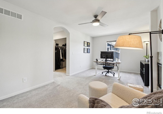 4109 Frederick Cir, Longmont, CO 80503 - carpeted office featuring arched walkways, baseboards, and a ceiling fan