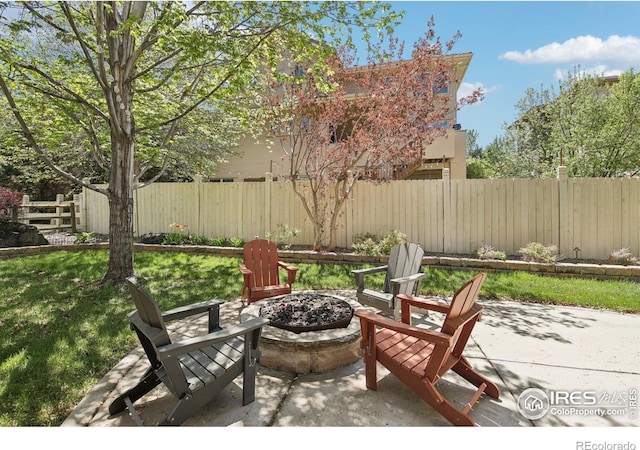 4109 Frederick Cir, Longmont, CO 80503 - view of patio / terrace featuring an outdoor fire pit