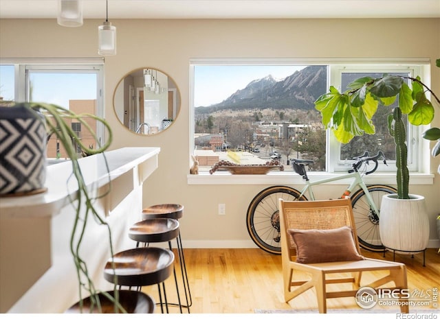 1201 Balsam Ave Unit 302, Boulder, CO 80304 - sitting room with a mountain view and wood finished floors