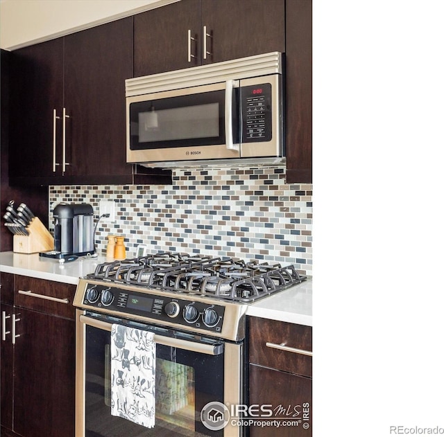 1201 Balsam Ave Unit 302, Boulder, CO 80304 - kitchen with stainless steel appliances and dark brown cabinets
