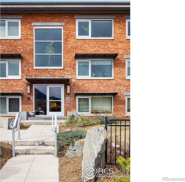 1201 Balsam Ave Unit 302, Boulder, CO 80304 - view of front of house featuring brick siding