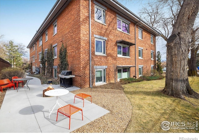 1201 Balsam Ave Unit 302, Boulder, CO 80304 - view of property with an outdoor fire pit