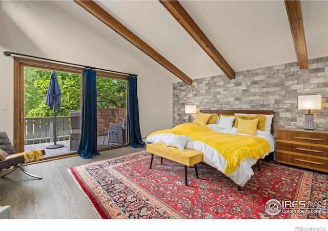 4456 W Pioneer Dr, Greeley, CO 80634 - bedroom with access to outside and wood finished floors