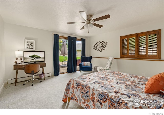 4456 W Pioneer Dr, Greeley, CO 80634 - carpeted bedroom featuring access to exterior, a baseboard heating unit, and a ceiling fan