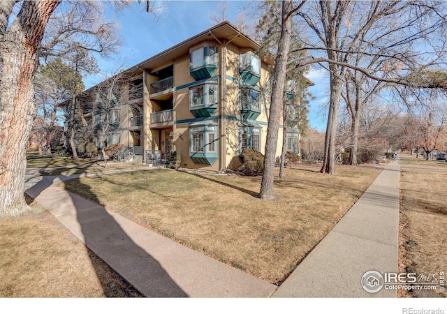 400 Emery St Unit 208, Longmont, CO 80501 - view of apartment building / complex