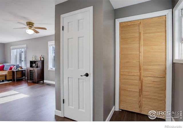 400 Emery St Unit 208, Longmont, CO 80501 - corridor with dark wood finished floors and baseboards